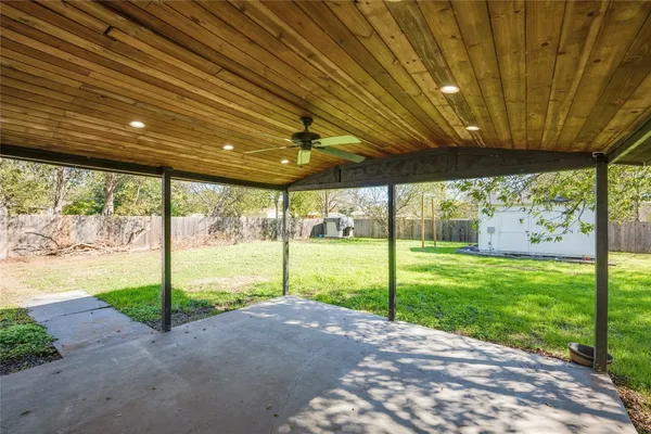 a view of a backyard with garden