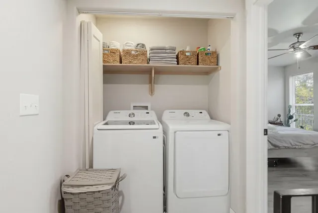 a view of a house with a yard and garage