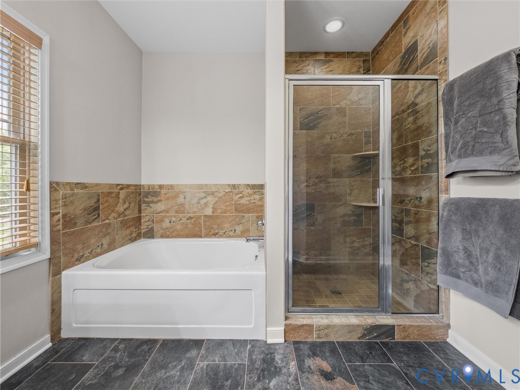 10824 Avening Road Chesterfield, VA 23832 - Photo 25 of 47 a bathroom with a bathtub and shower