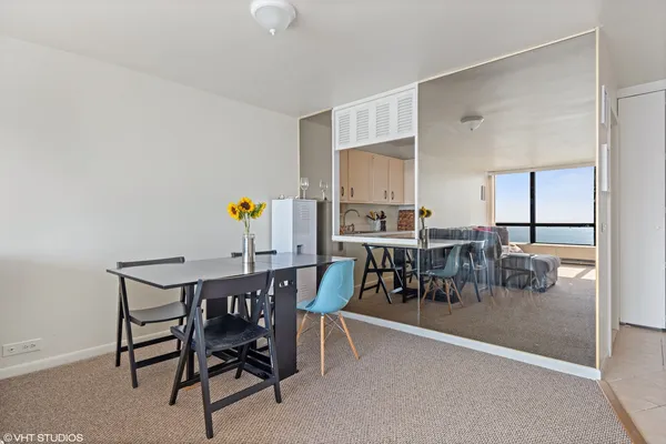 a view of a dining room with furniture