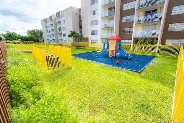a view of building with garden