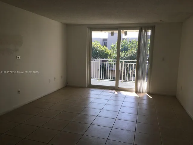 a white toilet sitting next to a bath tub and a shower