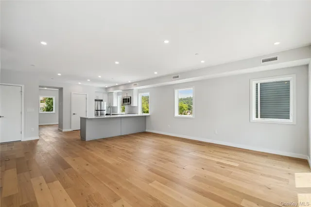 a view of a yard from a balcony