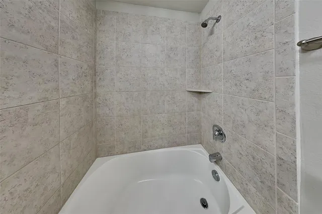 a bathroom with a bathtub