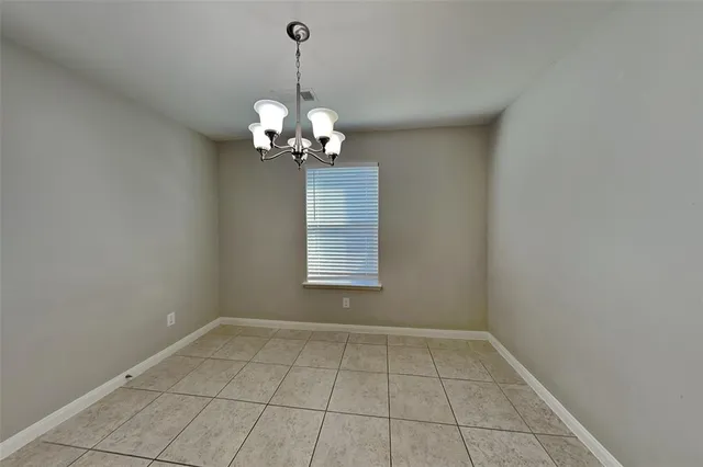 a view of a room with windows