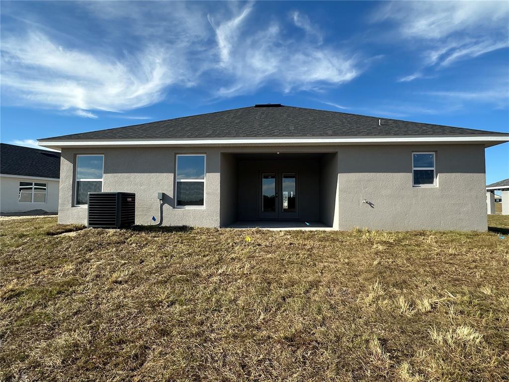 4546 Southwest 90th Ln Road Ocala, FL 34476 - Photo 9 of 9 a house view with a outdoor space