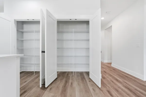 a view of a room with racks on the wall