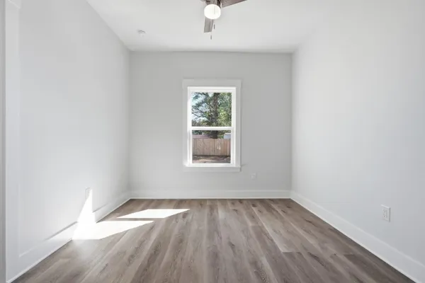 a view of a room with storage and racks on wall