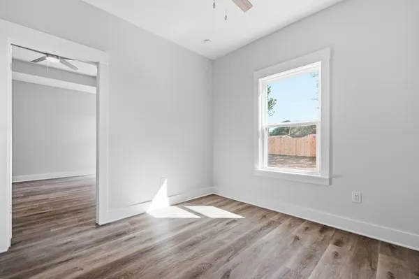 a view of a room with stairs and mirrors