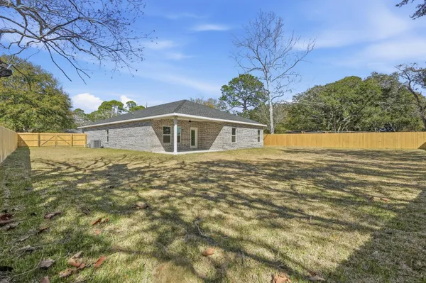 a bathroom with a sink vanity and a mirror