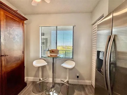 a bathroom with a sink a toilet and a shower