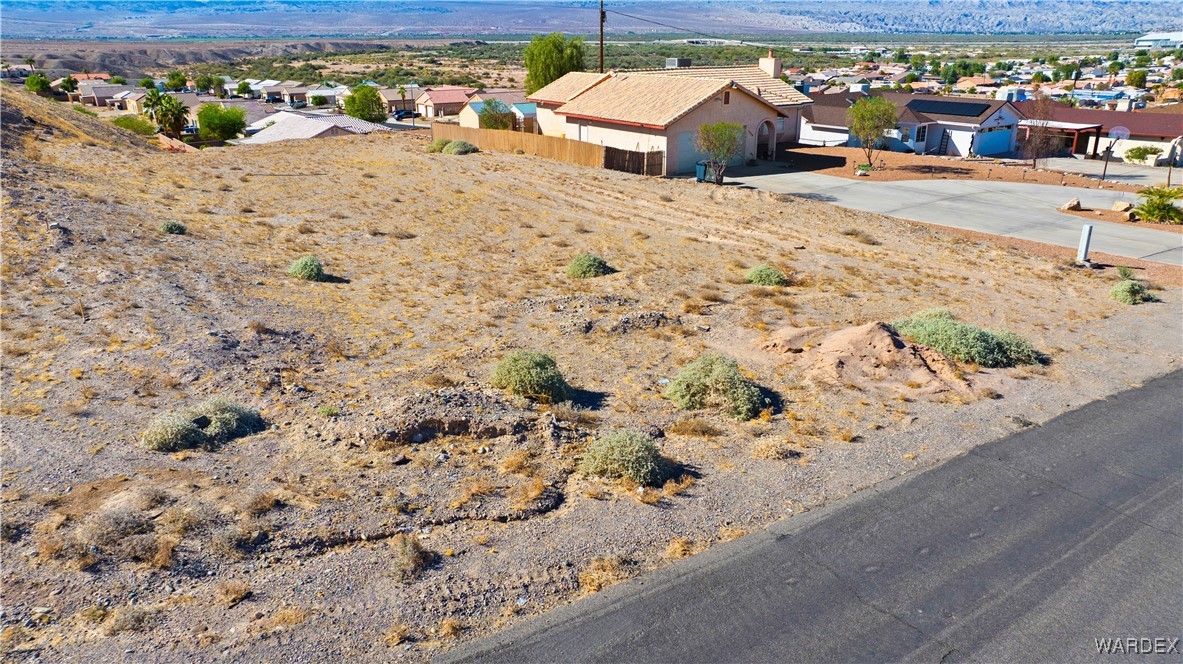 3935 King Road Bullhead City, AZ 86442 - Photo 7 of 7 a view of swimming pool with a lawn chairs