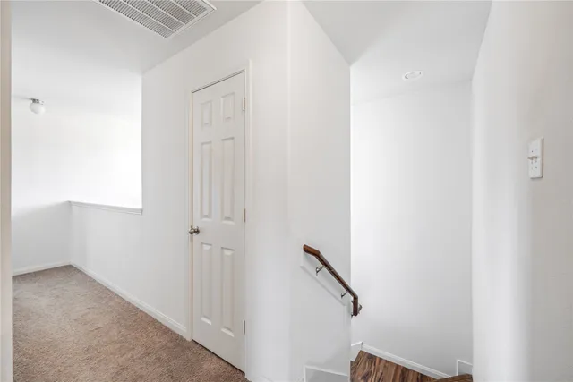 a view of a hallway with the shower