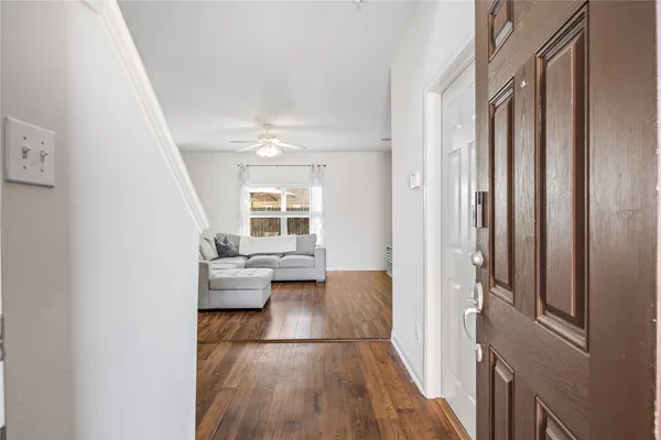 a view of livingroom with furniture and wooden floor