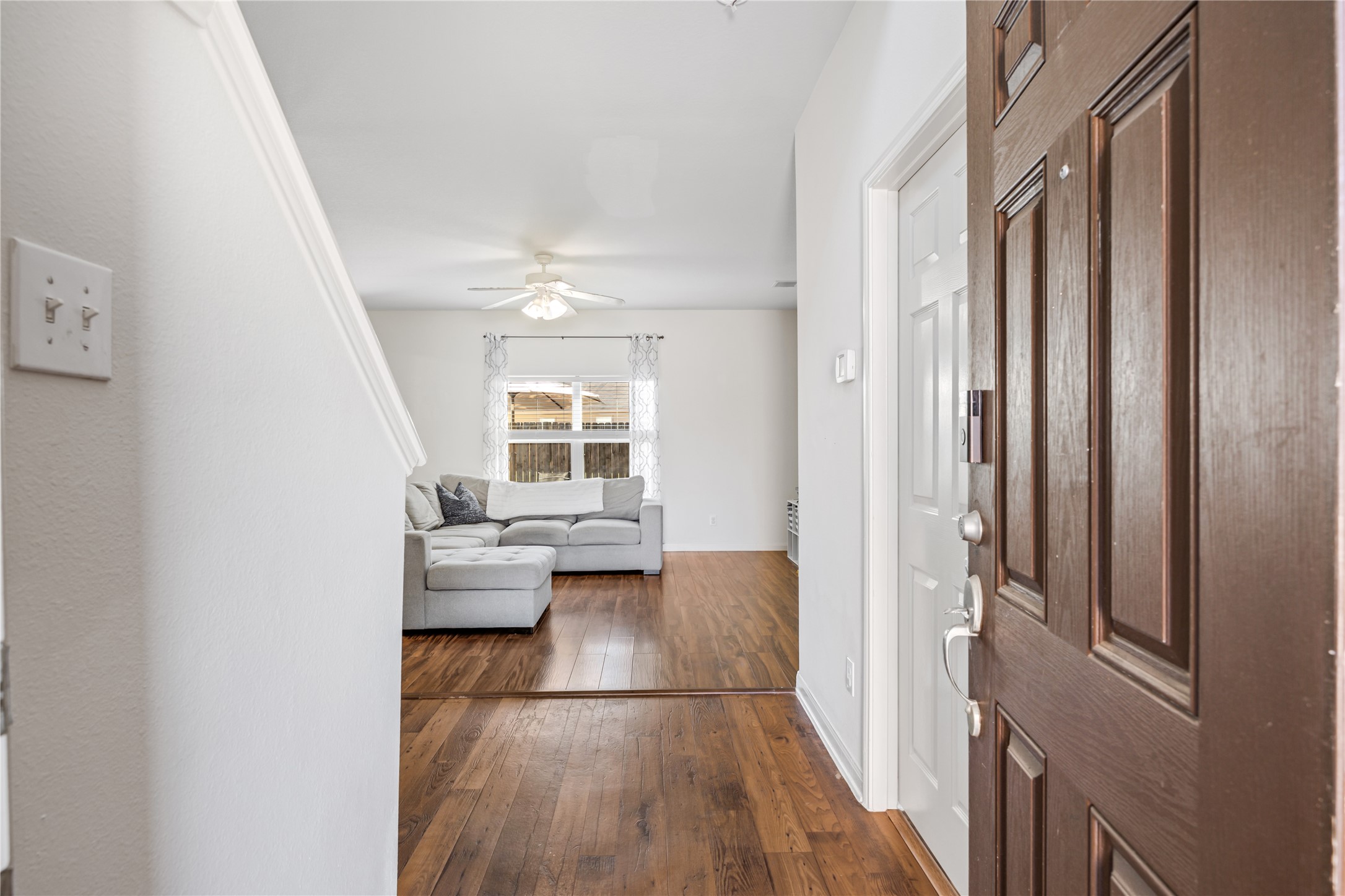 319 Falling Pine Drive Conroe, TX 77304 - Photo 3 of 22 a view of livingroom with furniture and wooden floor