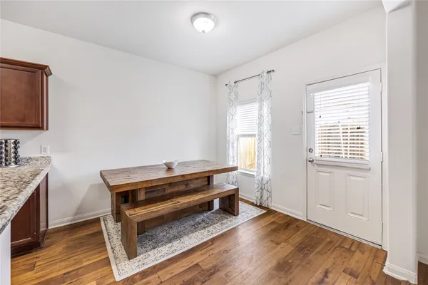 a room with a bed and a window