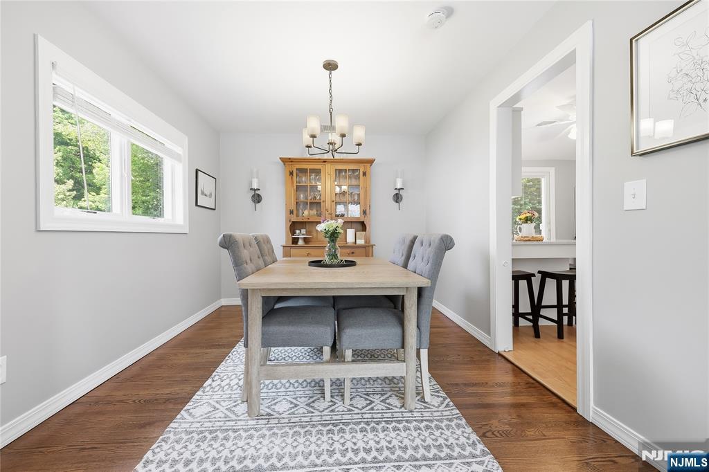 77 White Pond Road Waldwick, NJ 07463 - Photo 4 of 33 a view of a dining room with a table and chairs
