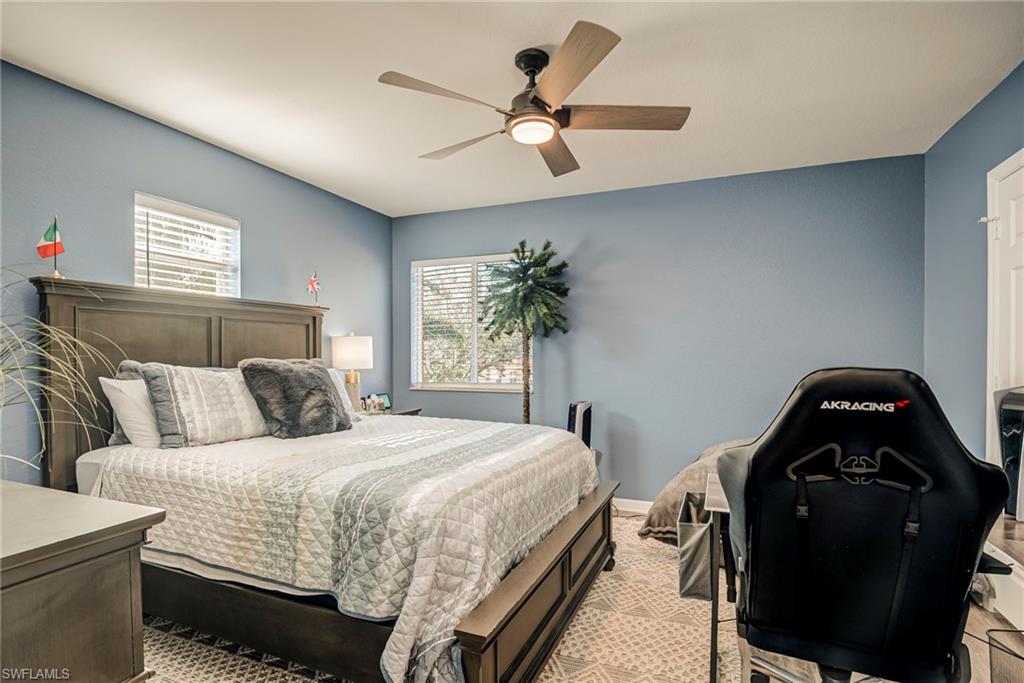 1897 Par Drive Naples, FL 34120 - Photo 25 of 31 a bedroom with bed and a window