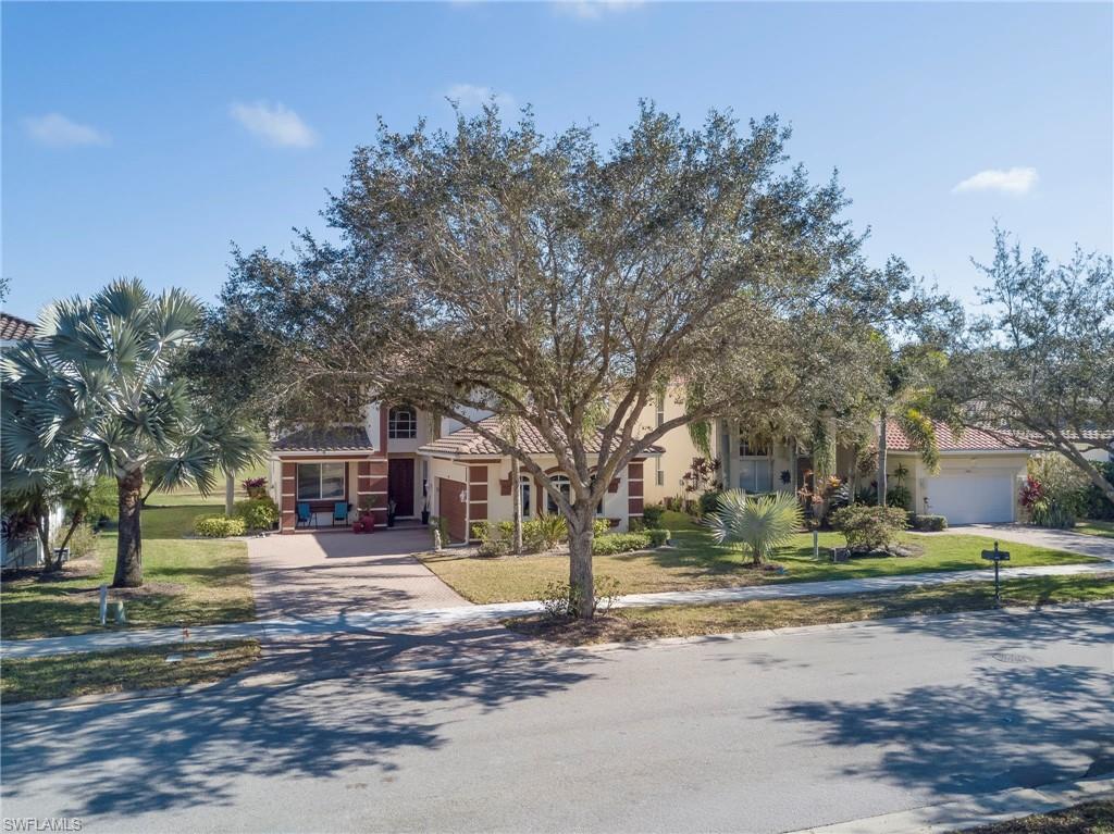 1897 Par Drive Naples, FL 34120 - Photo 29 of 31 a view of a yard with plants and trees