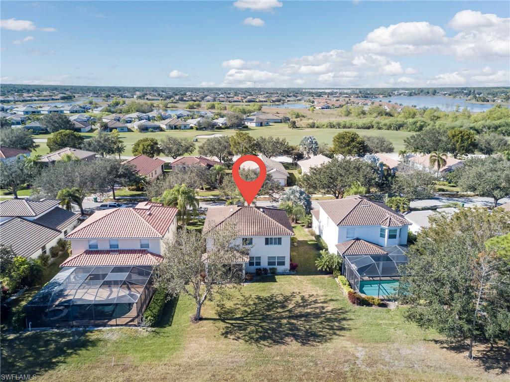 1897 Par Drive Naples, FL 34120 - Photo 30 of 31 an aerial view of a house with a ocean view