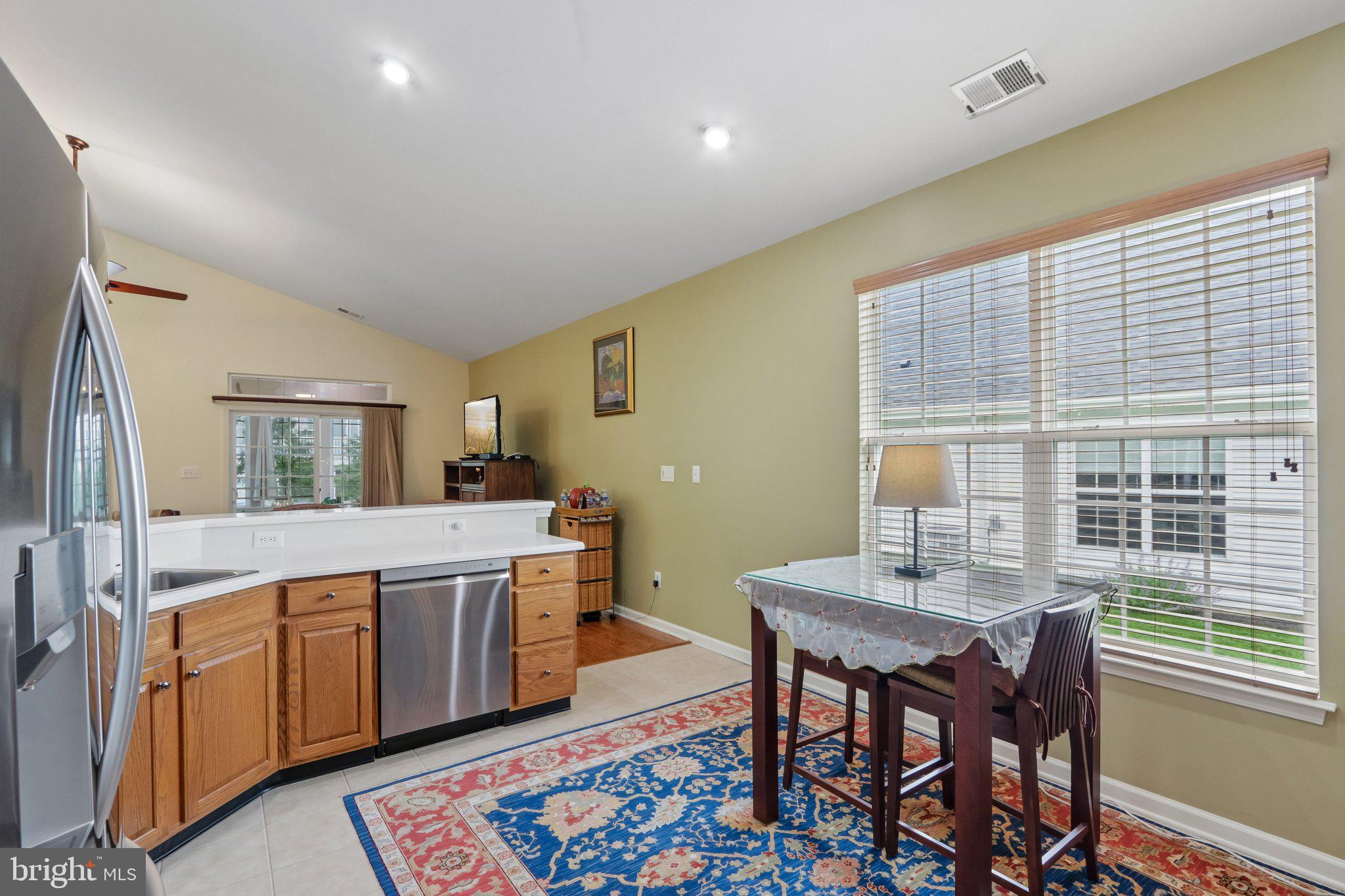 39 Danbury Road Swedesboro, NJ 08085 - Photo 12 of 62 a kitchen with a table and chairs in it