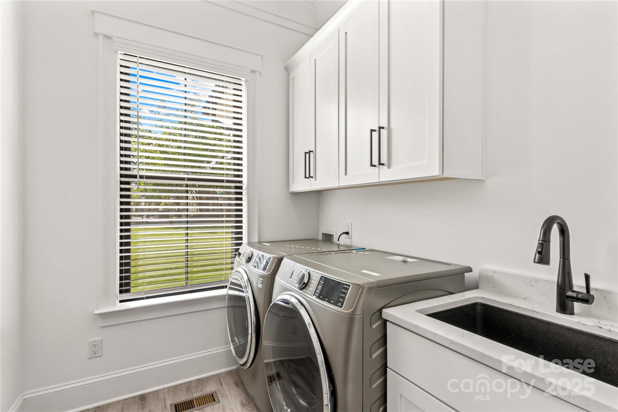 269 Conroy Avenue Davidson, NC 28036 - Photo 14 of 48 a utility room with dryer and washer