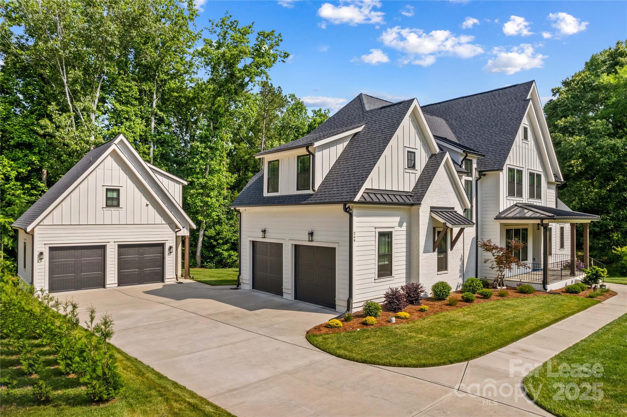 269 Conroy Avenue Davidson, NC 28036 - Photo 2 of 48 a front view of a house with a yard