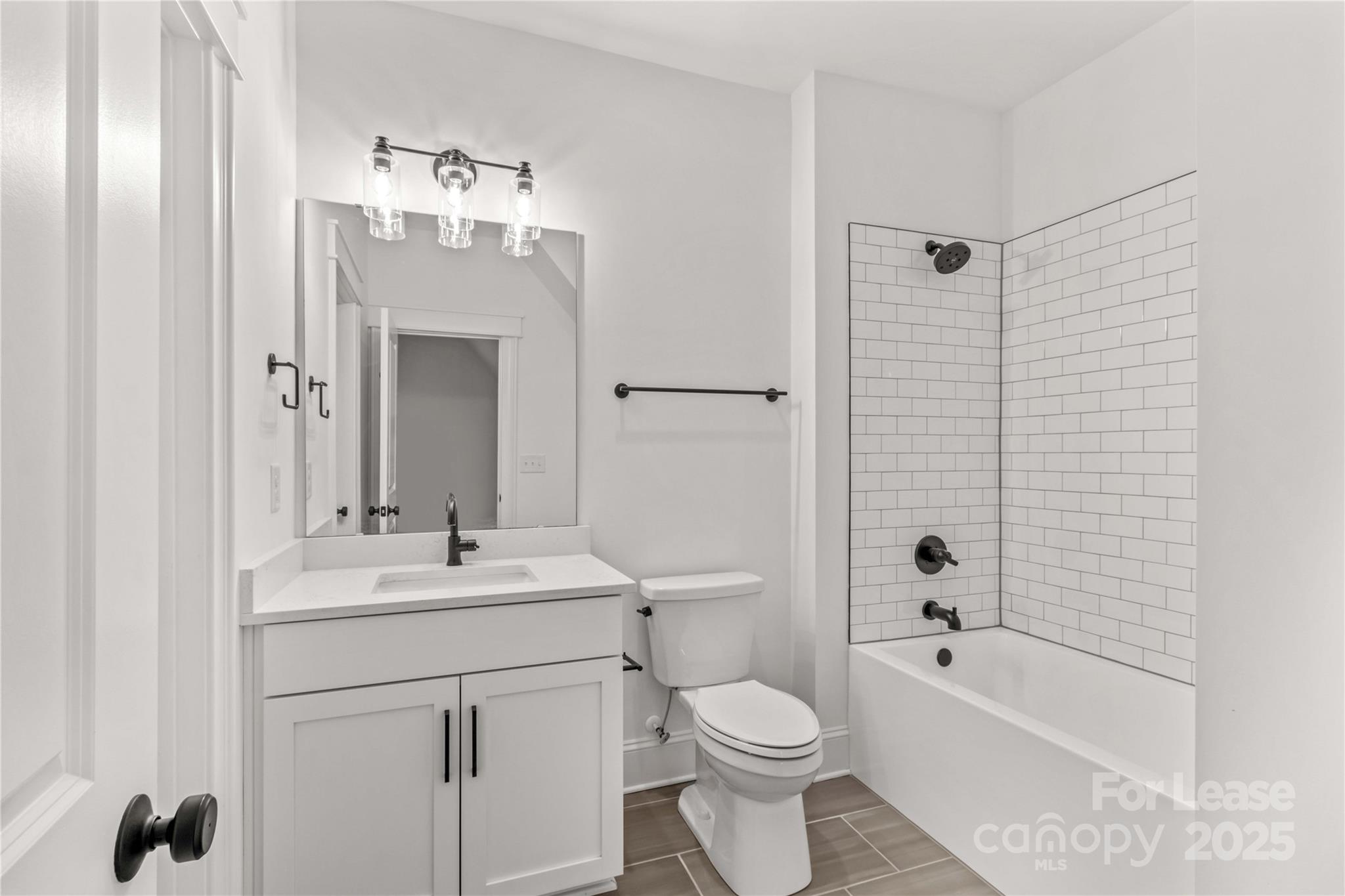 269 Conroy Avenue Davidson, NC 28036 - Photo 31 of 48 a bathroom with a sink a toilet and shower