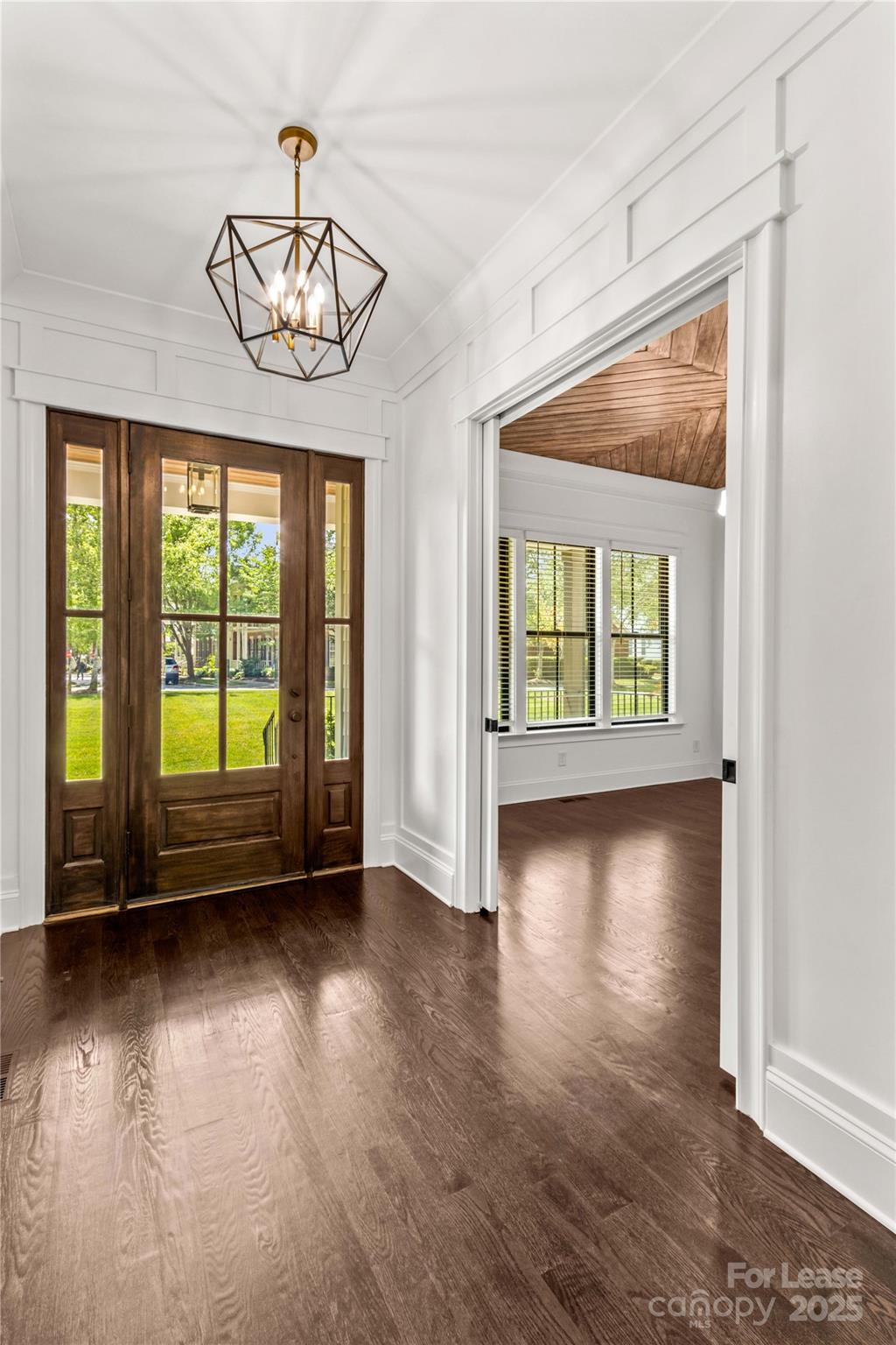 269 Conroy Avenue Davidson, NC 28036 - Photo 5 of 48 a view of livingroom with furniture wooden floor and windows