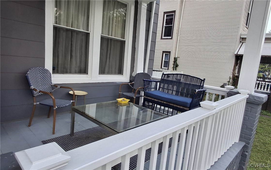 5 West Graham Road Richmond, VA 23222 - Photo 11 of 42 a view of a chairs and tables in the balcony