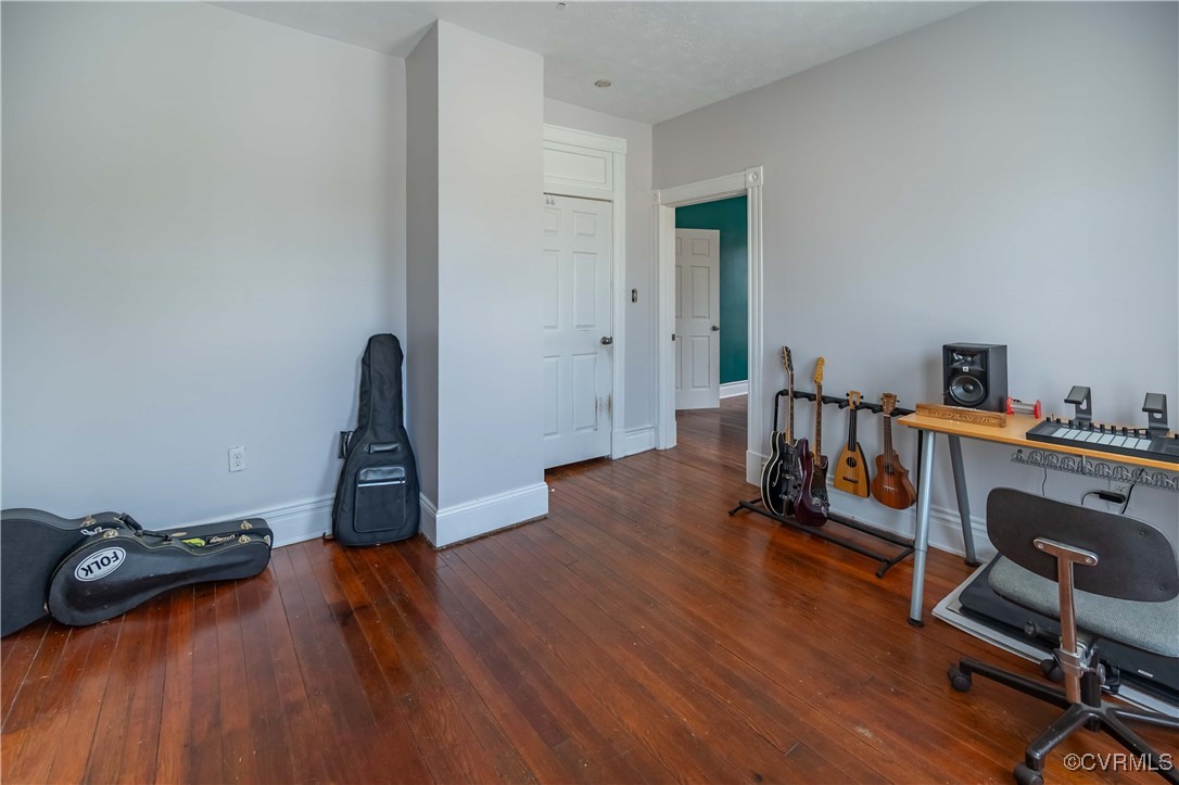 5 West Graham Road Richmond, VA 23222 - Photo 30 of 42 a view of a workspace with furniture and wooden floor