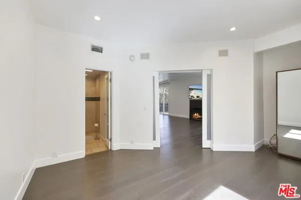a view of balcony with furniture