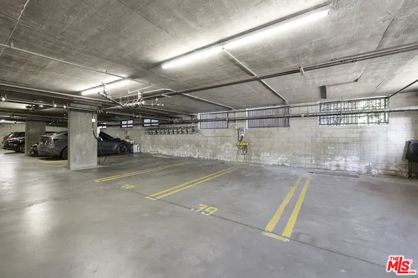 a view of swimming pool with a patio