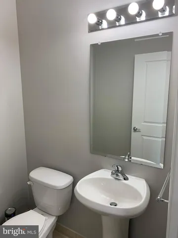 a view of a living room with a large window