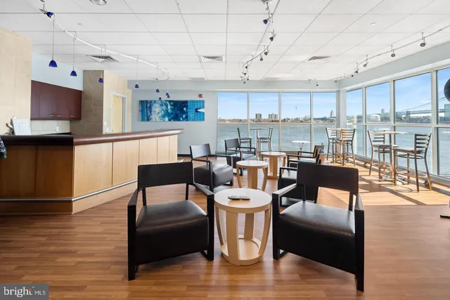 a bathroom with a shower and a mirror