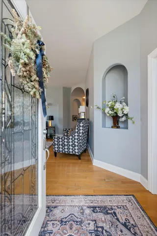 a view of entryway with a chandelier
