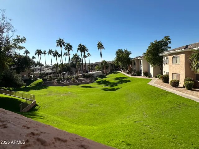 a view of a house with a big yard
