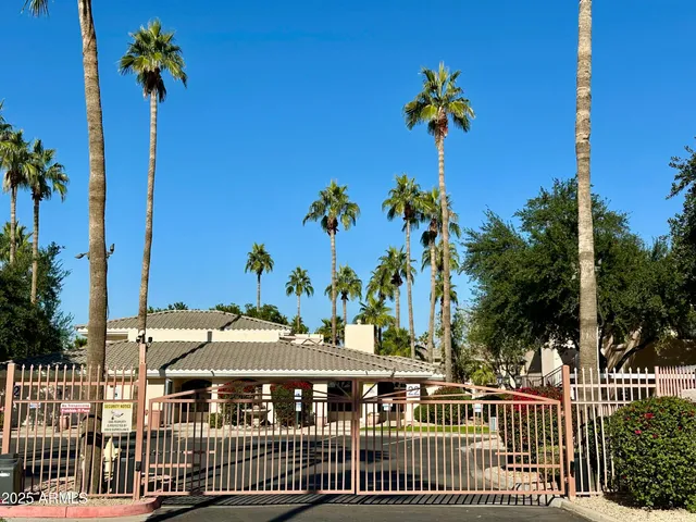 a view of a house with a flower garden