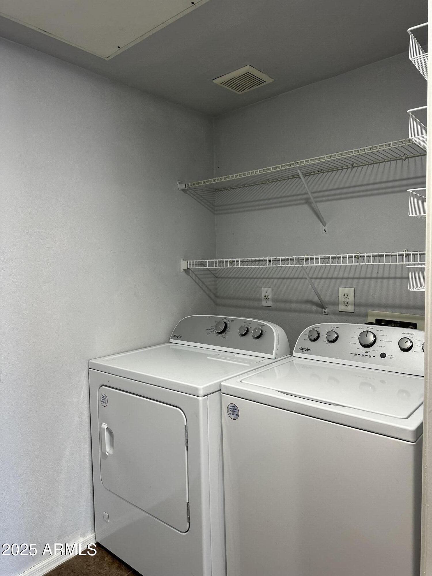 10030 West Indian School Road, Unit 227 Phoenix, AZ 85037 - Photo 22 of 22 a utility room with dryer and washer