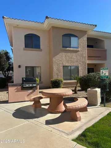 a view of a house with swimming pool