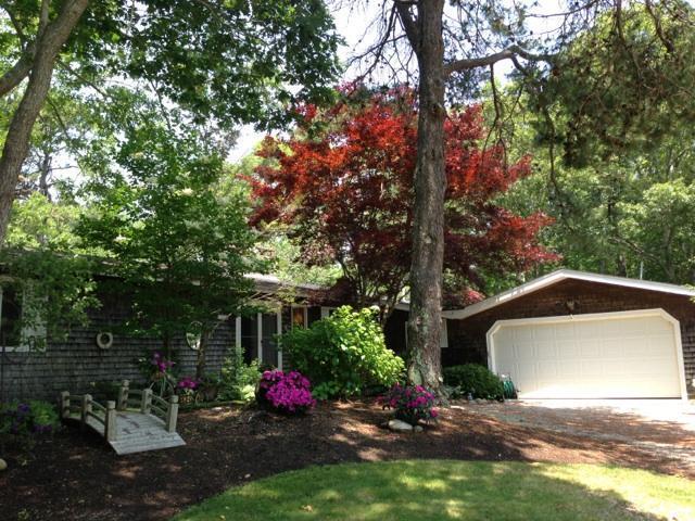 168 Holly Point Road Centerville, MA 02632 - Photo 1 of 28 a view of a garden