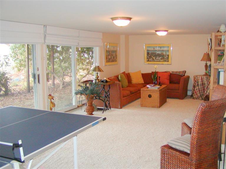 168 Holly Point Road Centerville, MA 02632 - Photo 23 of 28 a living room with furniture and large window