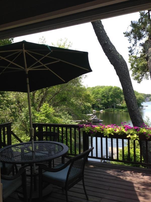 168 Holly Point Road Centerville, MA 02632 - Photo 3 of 28 a view of balcony with furniture and umbrella