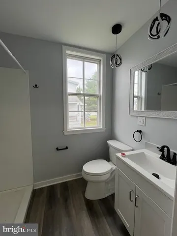 a bathroom with a sink and a toilet