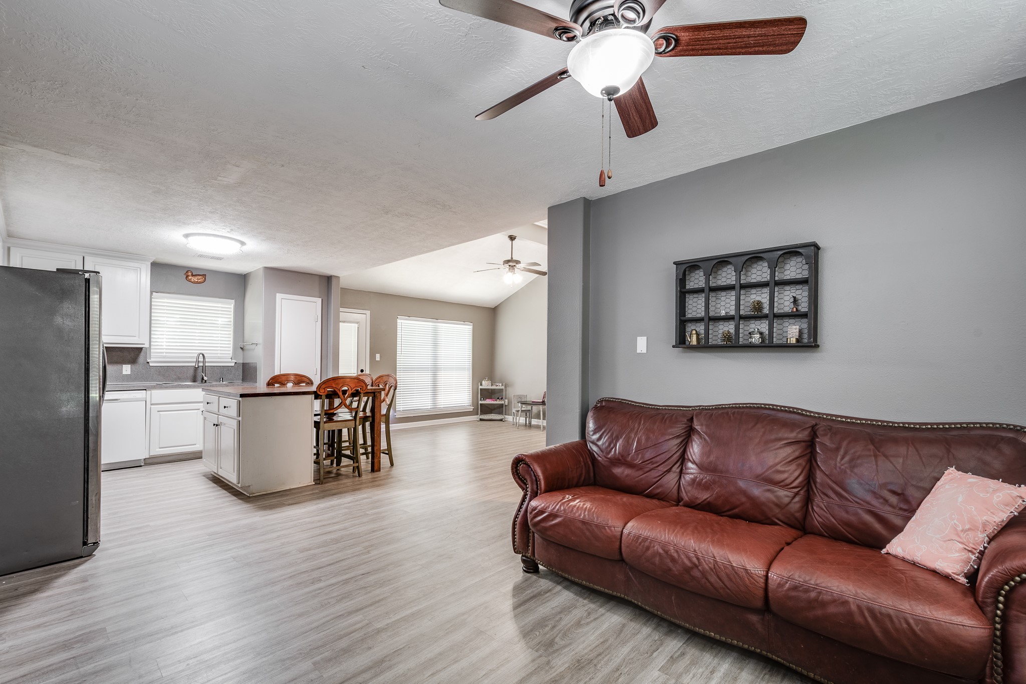 16392 Many Trees Lane Conroe, TX 77302 - Photo 16 of 33 The kitchen is open to both the family and dining room