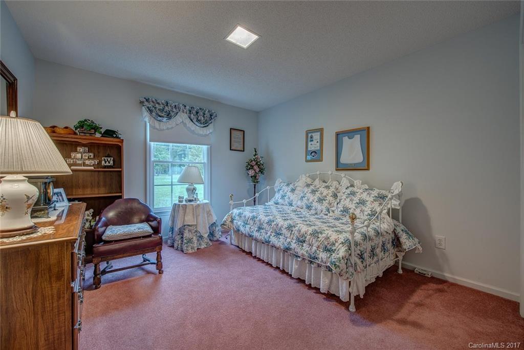 404 Loray Farm Road Dallas, NC 28034 - Photo 18 of 23 a living room with furniture a couch and a window