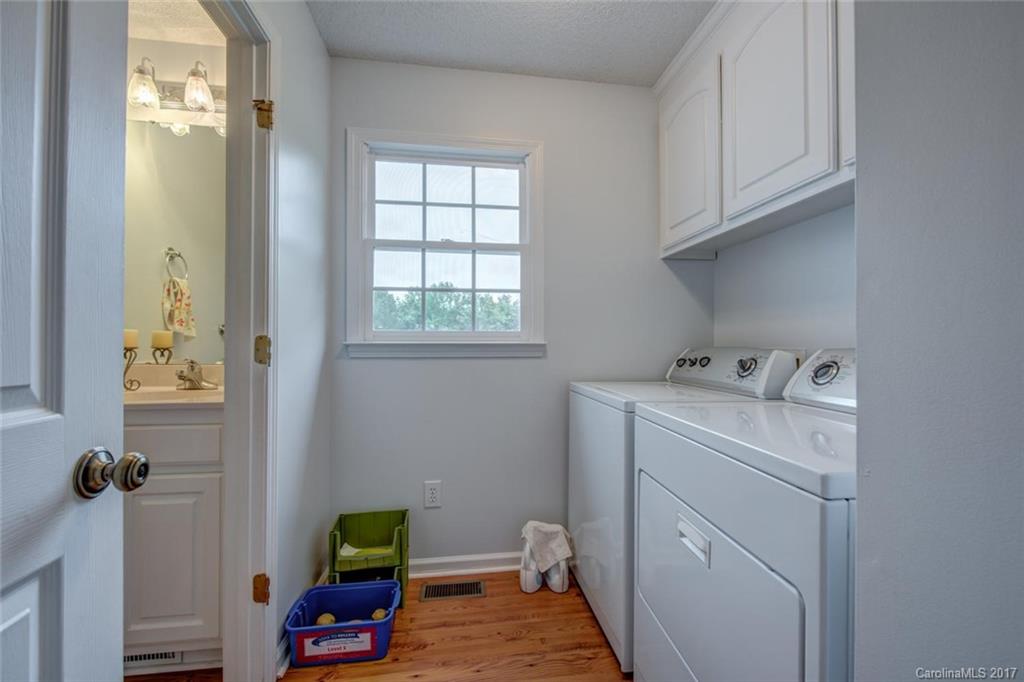 404 Loray Farm Road Dallas, NC 28034 - Photo 20 of 23 a utility room with dryer and washer