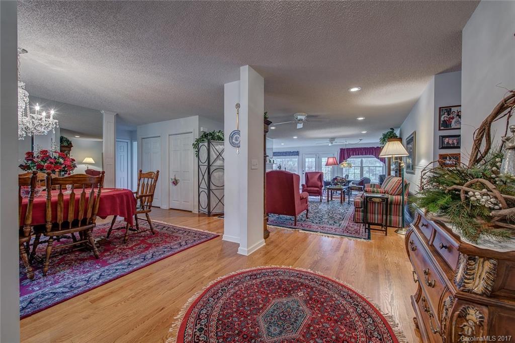 404 Loray Farm Road Dallas, NC 28034 - Photo 3 of 23 a living room with furniture and wooden floor