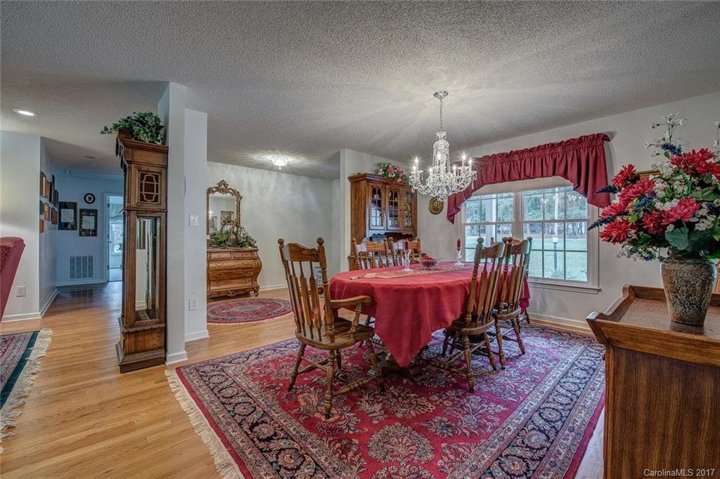 404 Loray Farm Road Dallas, NC 28034 - Photo 4 of 23 a view of a dining room with furniture