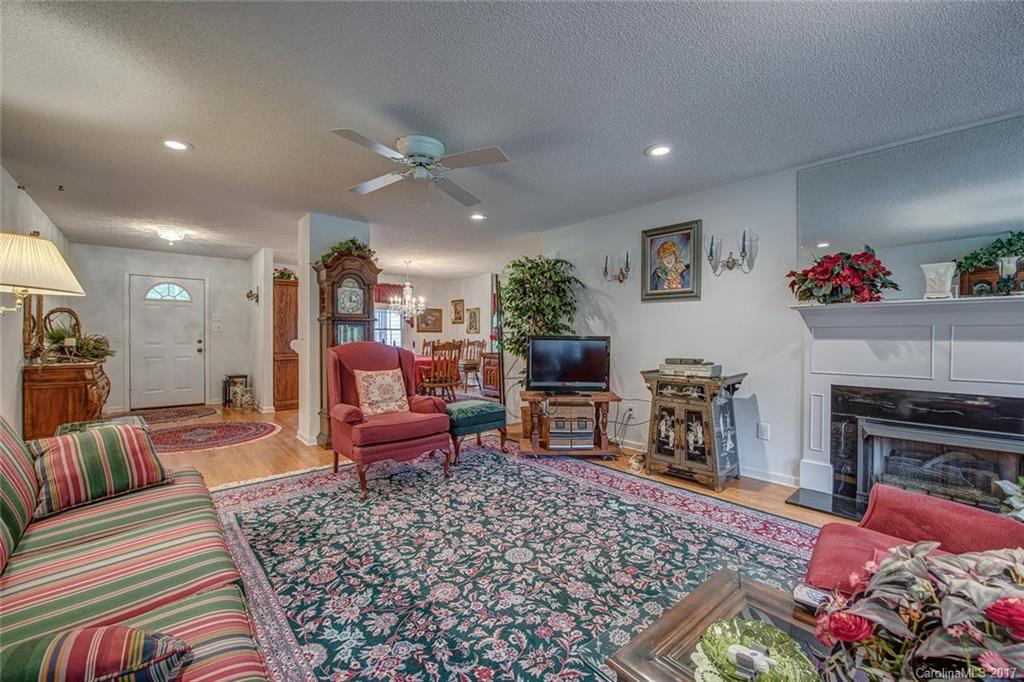 404 Loray Farm Road Dallas, NC 28034 - Photo 6 of 23 a living room with furniture and a fireplace